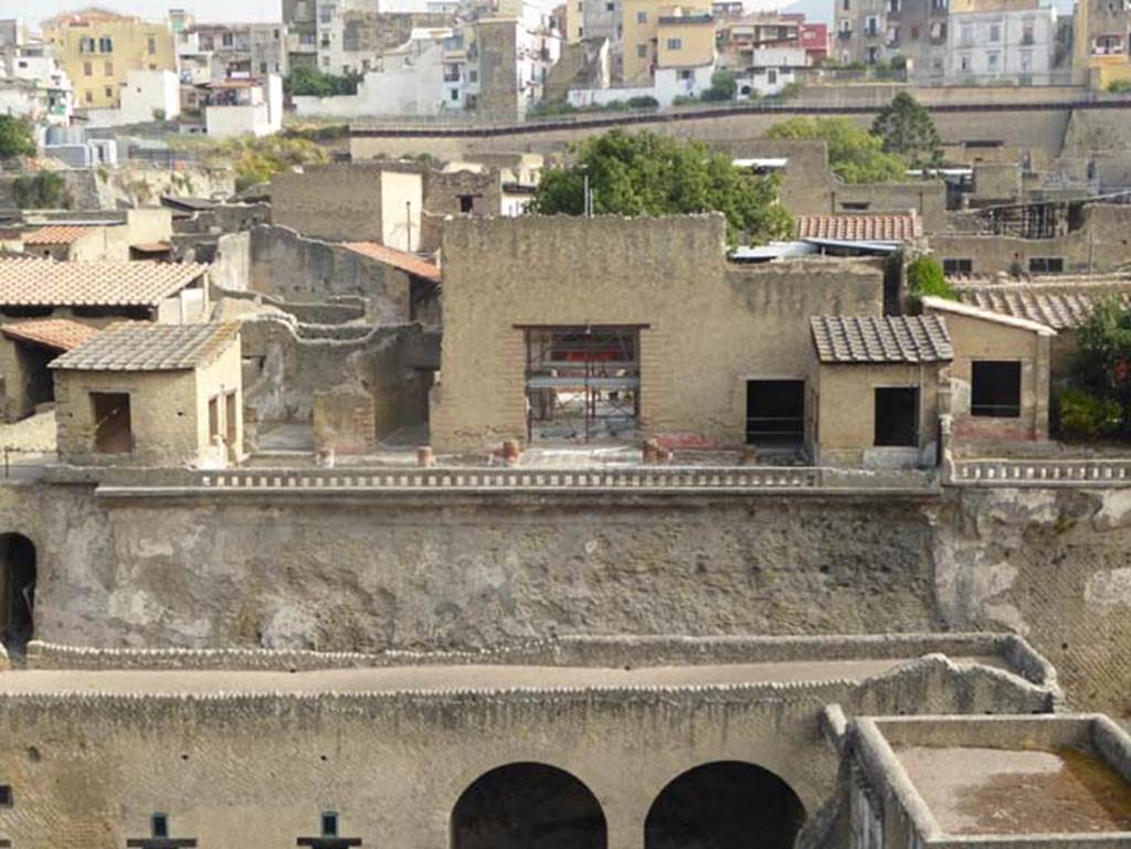 IV.1, Herculaneum, October 2014. Looking north towards terrace and rooms looking onto it, taken from access roadway. Photo courtesy of Michael Binns.